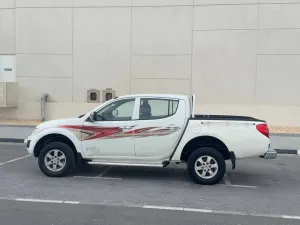 2013 ميتسوبيشي أل٢٠٠ double-cab