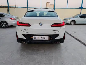 2023 بي أم دابليو اكس - 4 M
