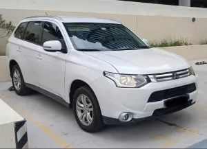 2015 ميتسوبيشي أوتلاندر SEL Touring Package