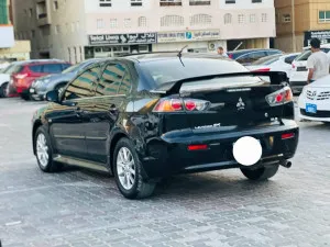 2015 ميتسوبيشي لانسر GL