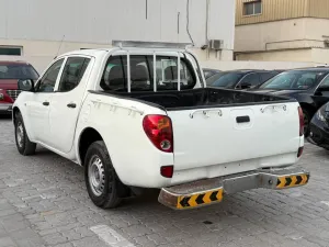 2013 ميتسوبيشي أل٢٠٠ double-cab