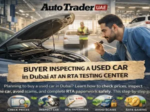 Buyer inspecting a used car in Dubai at an RTA testing center
