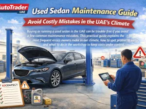 Used sedan undergoing maintenance check in a UAE workshop