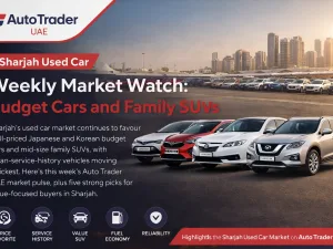 Used budget cars and family SUVs lined up in a Sharjah UAE car market