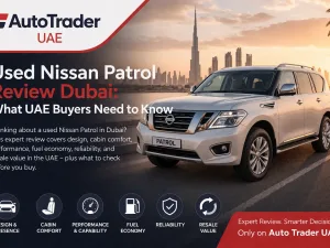 Used Nissan Patrol SUV parked in Dubai street skyline