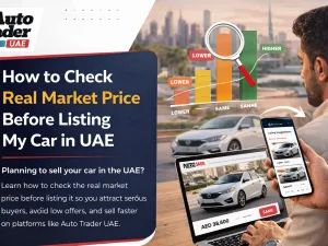 Seller checking real market price of car online before listing it for sale in UAE