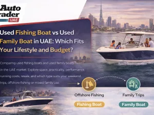 Used fishing boat and used family boat moored in a UAE marina at sunset