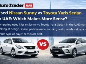 Used Nissan Sunny and Toyota Yaris Sedan parked side by side in the UAE