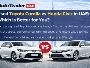 Used Toyota Corolla and Honda Civic parked side by side in UAE