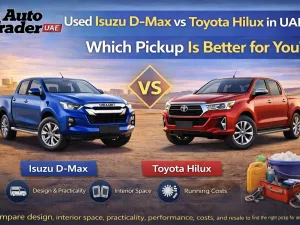 Used Isuzu D-Max and Toyota Hilux parked side by side in the UAE desert