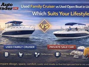 Used family cruiser and used open boat side by side in a UAE marina