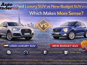 Used luxury SUV and new budget SUV parked side by side in UAE