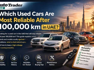 Used Toyota and Nissan sedans and SUVs parked in the UAE, showing models known for reliability after 100,000 km