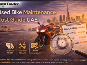 Used motorcycle parked in the UAE with tools and helmet, illustrating maintenance costs