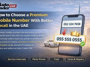 Premium mobile number displayed on smartphone in UAE car showroom