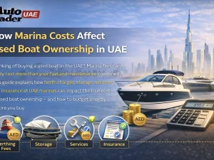 Used motorboat moored at a UAE marina with waterfront buildings in the background