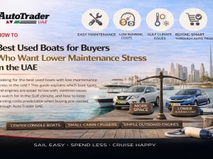Used fiberglass center console boat with outboard engine cruising in UAE waters