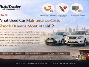 Mechanic inspecting a used car in a UAE workshop to explain unexpected maintenance costs