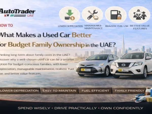 Family inspecting a budget-friendly used car in the UAE