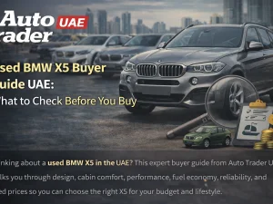 Used BMW X5 SUV parked in a modern urban setting in the UAE