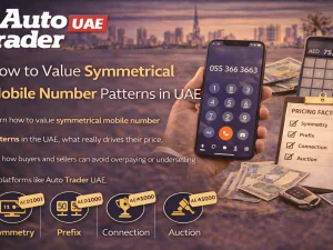 Symmetrical UAE mobile number pattern displayed on a smartphone next to car keys