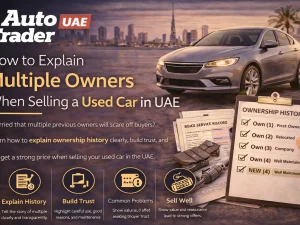 Seller discussing ownership history of a used car with a buyer in the UAE