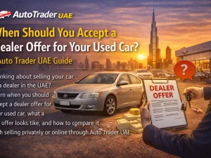 Car owner reviewing a dealer offer for a used car sale in the UAE showroom