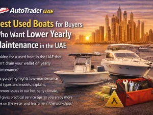 Used fiberglass center console boat with single outboard engine cruising in UAE waters