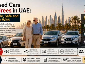 Senior driver in the UAE getting into a comfortable used car in a residential area