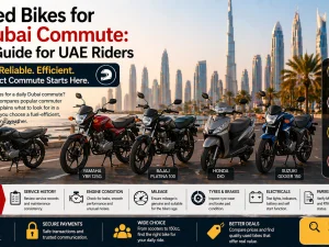 Commuter motorbike riding on a Dubai city road at sunset