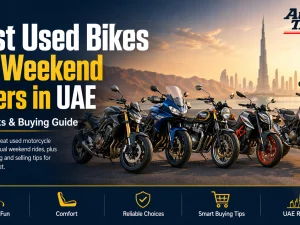 Used weekend motorcycle parked on UAE coastal road at sunset