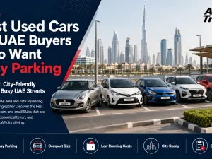 Compact used hatchback car parking easily in a tight UAE basement parking space