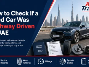 Used car being inspected for signs of highway driving in the UAE