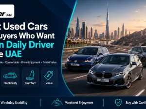 Sporty used hatchback driving on a UAE highway at sunset