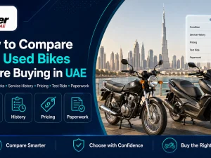 Two used motorcycles parked side by side being inspected by a buyer in the UAE