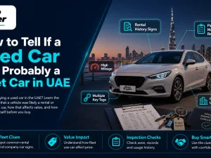 Used cars parked in a UAE lot, some likely ex-fleet vehicles