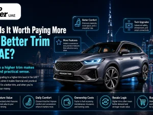 Customer comparing car trim levels in a UAE showroom