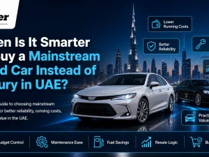 Mainstream used car parked beside a luxury car in UAE