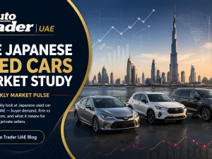 Japanese used cars lined up in a UAE dealership lot