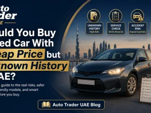 Used cars parked in a UAE showroom with price tags visible