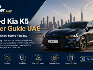 Used Kia K5 sedan parked in Dubai, UAE