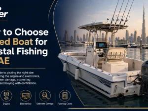 Used coastal fishing boat moored at a UAE marina at sunset