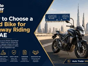 Used touring motorcycle riding on UAE highway at sunset