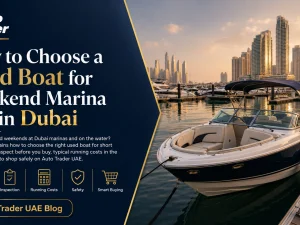 Used leisure boat moored in a Dubai marina at sunset
