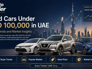 Used cars under AED 100,000 lined up in a UAE dealership parking area
