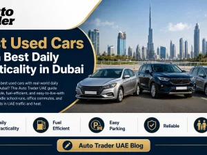 Line-up of practical used cars parked in Dubai with city skyline in the background
