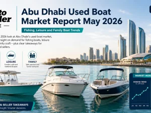 Used fishing and family boats moored at a modern Abu Dhabi marina at sunset