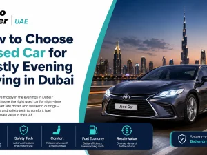 Night-time driving in Dubai with a used car on a well-lit city highway