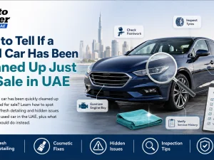 Used car being inspected after a quick cosmetic clean-up in UAE