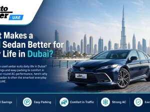 Used sedan driving on a Dubai city road at sunset